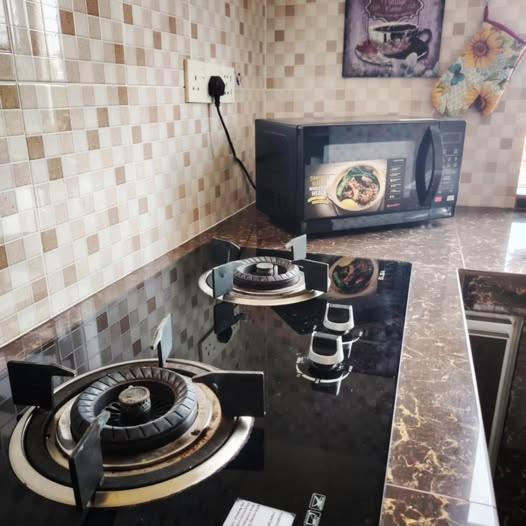 Topville Homestay Kangar Esterno foto